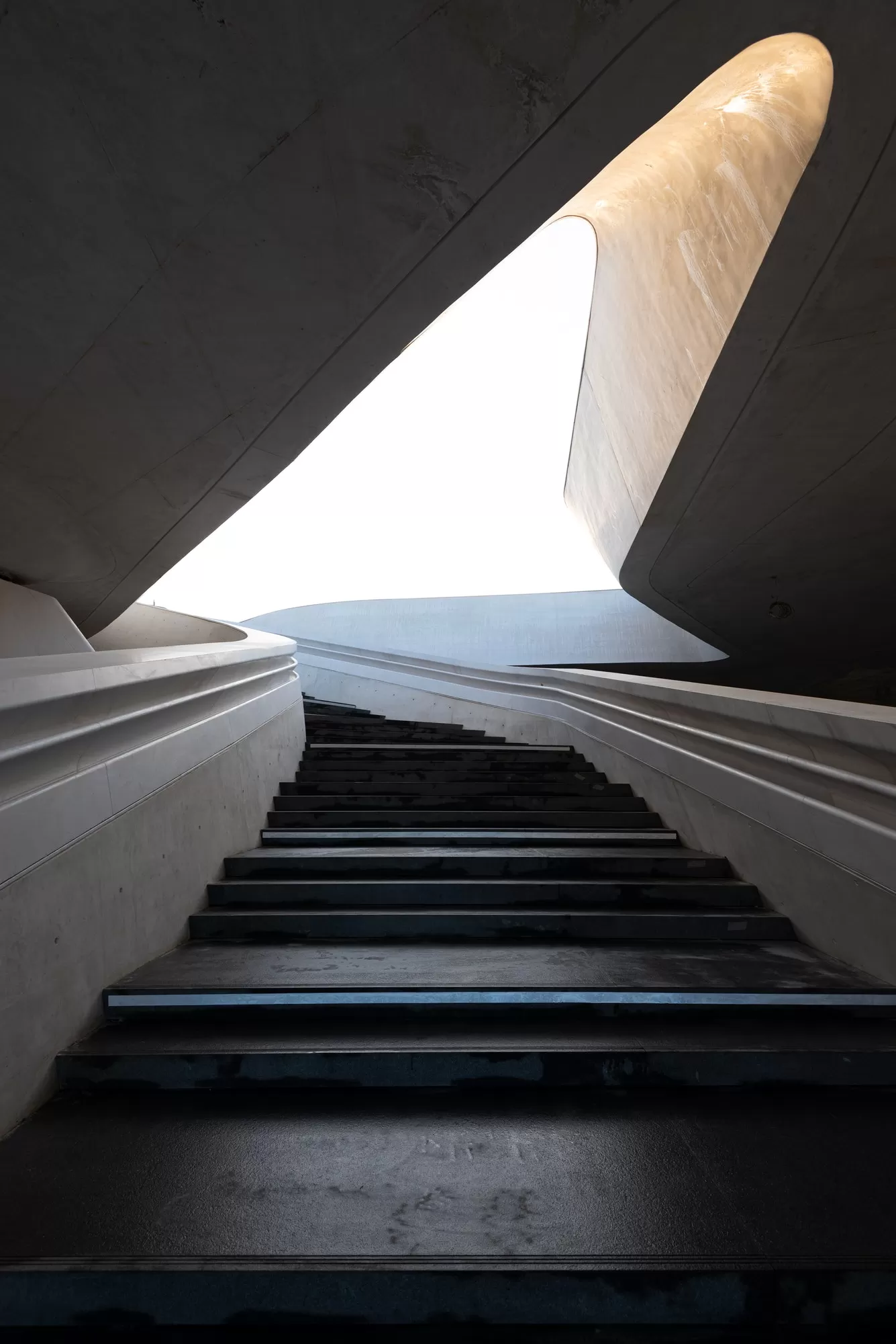 modern-architecture-and-empty-staircase-leading-to-a-bright-open-space.jpg